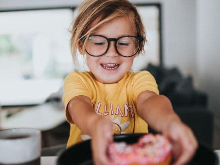 Kid eating at the table