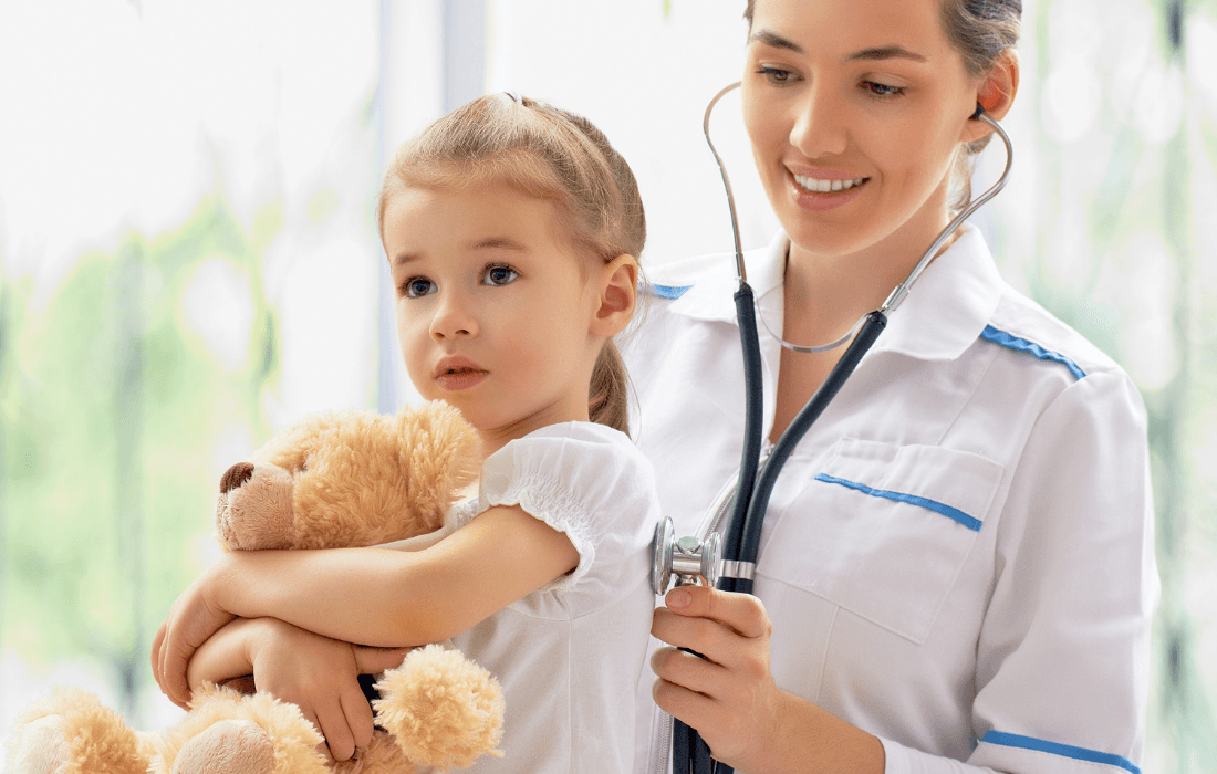 Toddler getting a checkup from her doctor